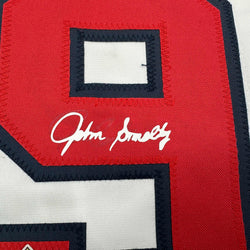 Framed Facsimile Autographed John Smoltz 35x39 Atlanta White Reprint Laser Auto Baseball Jersey (ONLINE ORDER ONLY)