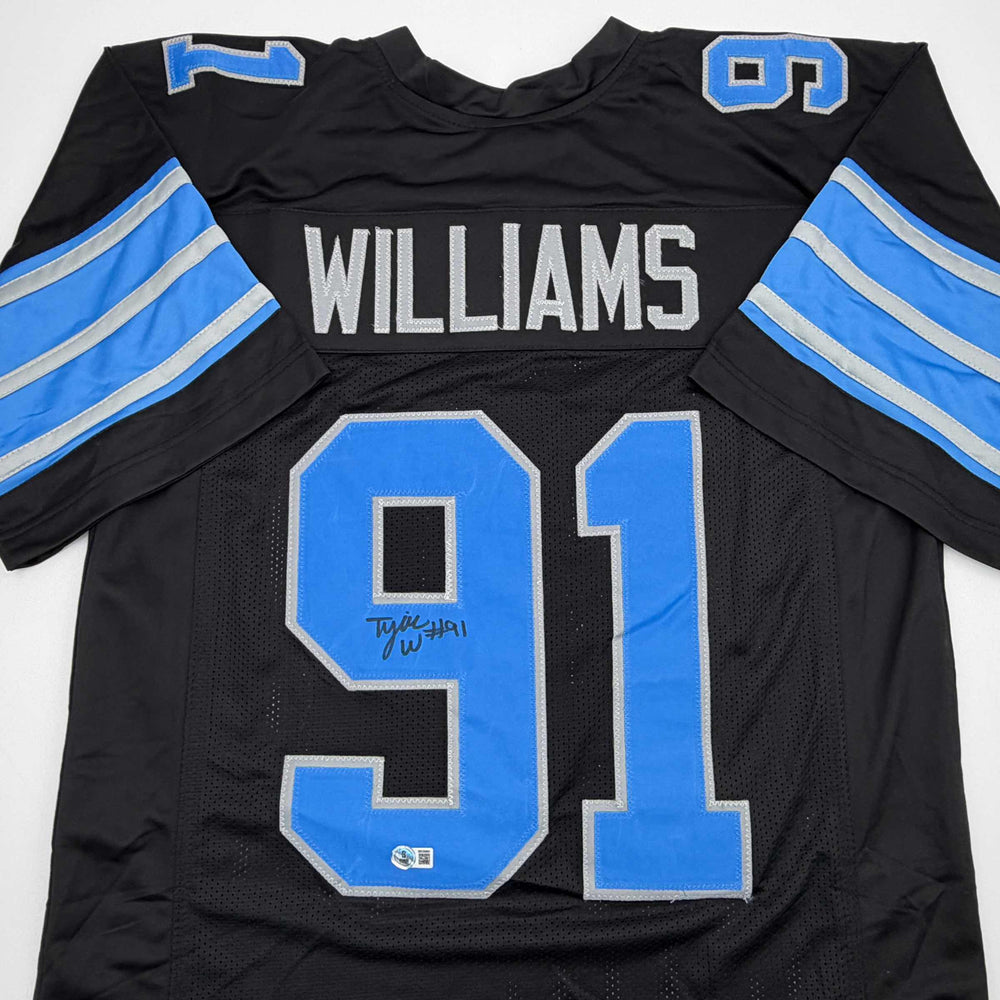 Autographed/Signed Tyleik Williams Detroit Black Football Jersey Beckett BAS COA (ONLINE ORDER ONLY)