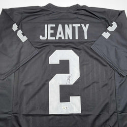 Autographed/Signed Ashton Jeanty Oakland Black Football Jersey Beckett BAS COA (ONLINE ORDER ONLY)