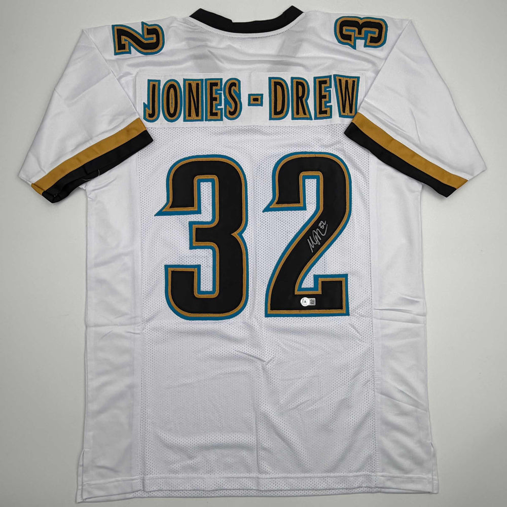 Autographed/Signed Maurice Jones-Drew Jacksonville White Football Jersey Beckett BAS COA (ONLINE ORDER ONLY)