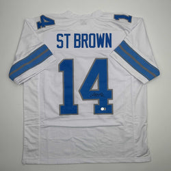 Autographed/Signed Amon-Ra St. Brown Detroit White Football Jersey Beckett BAS COA (ONLINE ORDER ONLY)