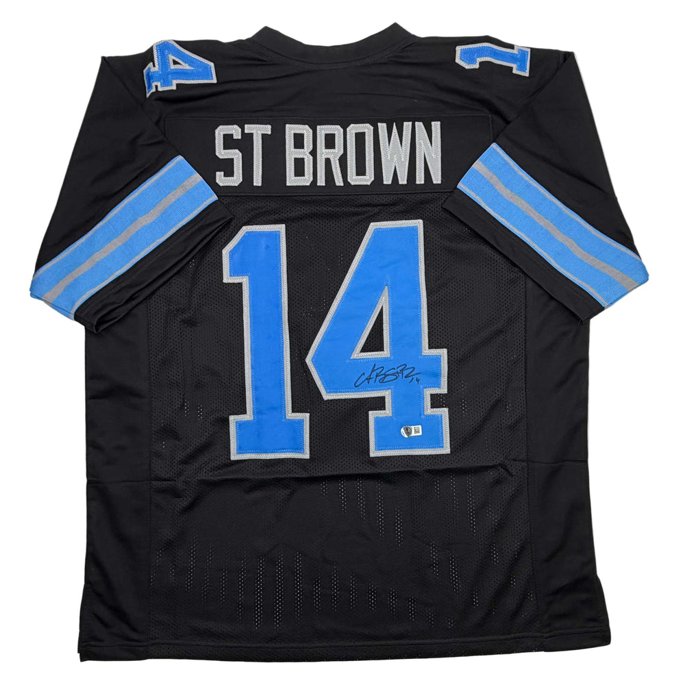 Autographed/Signed Amon-Ra St. Brown Detroit Black Football Jersey Beckett BAS COA (ONLINE ORDER ONLY)