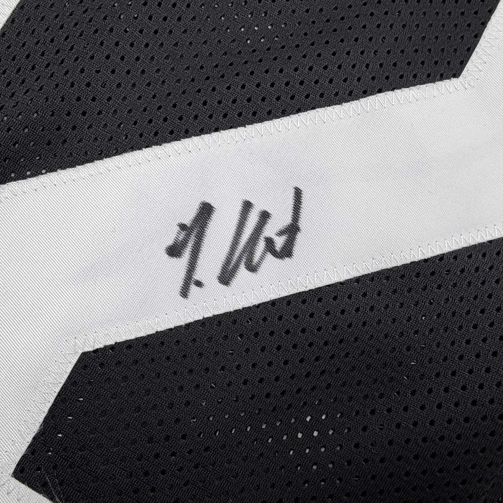 Autographed/Signed Travis Hunter Jacksonville Black Football Jersey Beckett BAS COA (ONLINE ORDER ONLY)