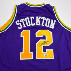 Autographed/Signed John Stockton Utah Purple Basketball Jersey Beckett BAS COA (ONLINE ORDER ONLY)