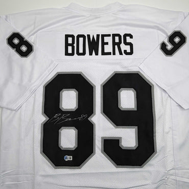 Autographed/Signed Brock Bowers Las Vegas Oakland White Football Jersey Beckett BAS COA (ONLINE ORDER ONLY)