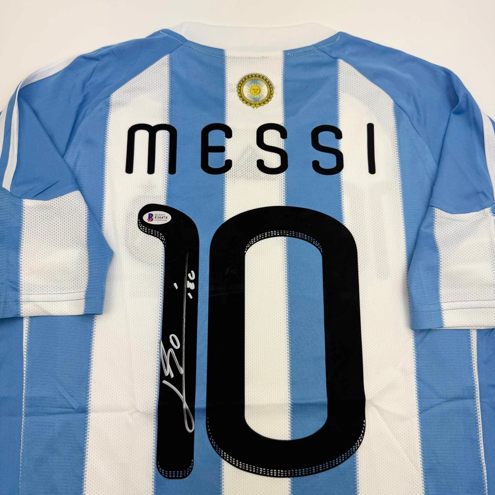 Autographed/Signed Lionel Leo Messi Argentina Blue/White Soccer Jersey Beckett BAS COA (ONLINE ORDER ONLY)