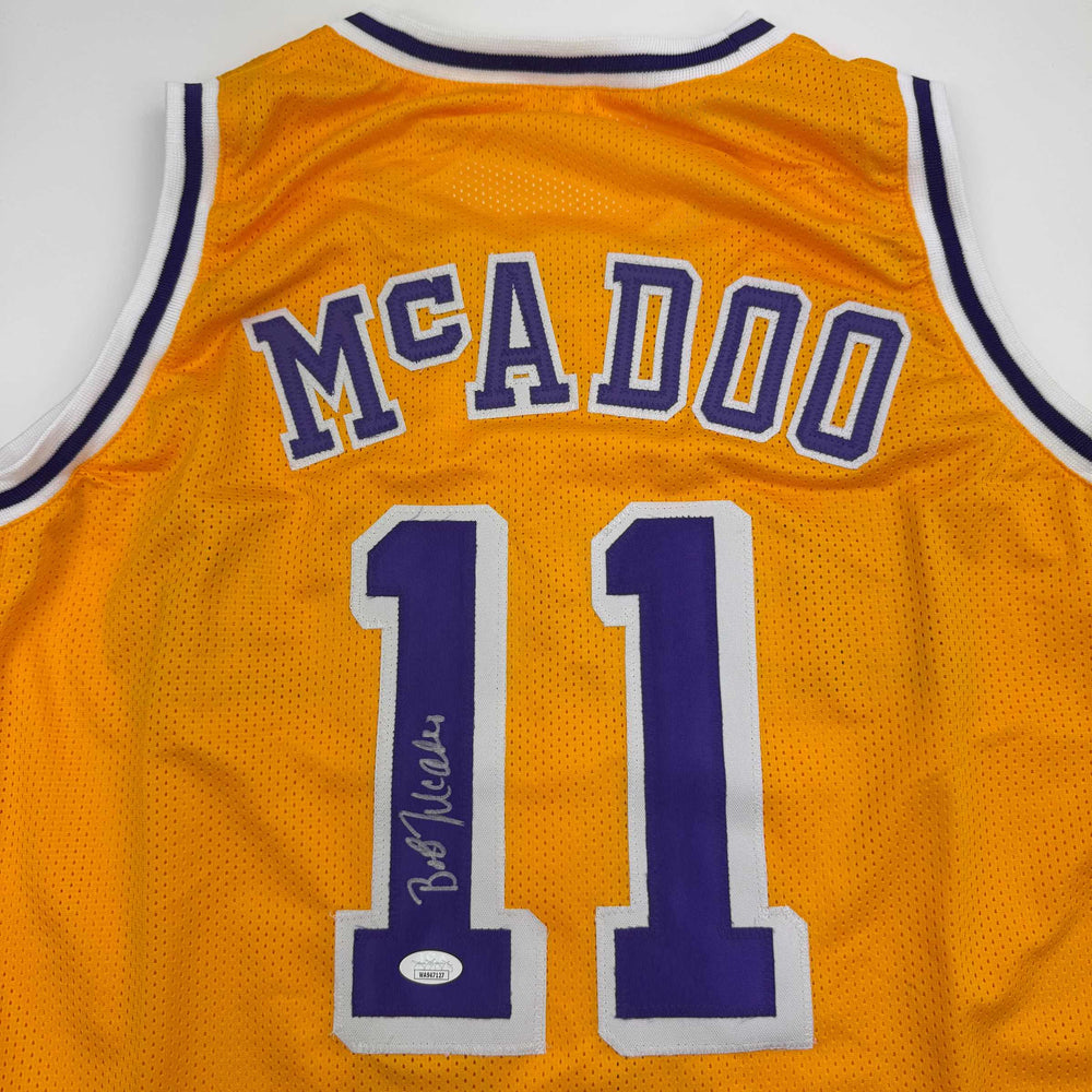 Autographed/Signed Bob McAdoo Los Angeles Yellow Basketball Jersey JSA COA (ONLINE ORDER ONLY)