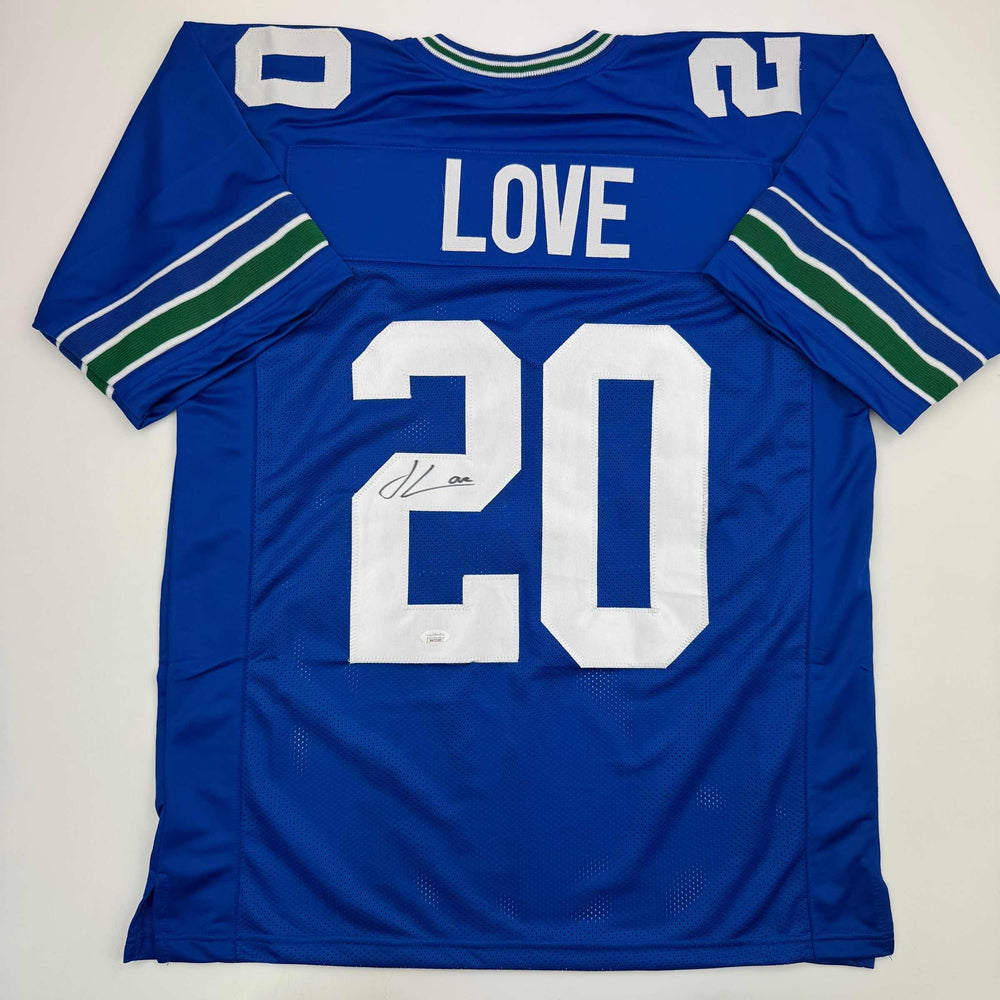 Autographed/Signed Julian Love Seattle Blue Retro Football Jersey JSA COA (ONLINE ORDER ONLY)