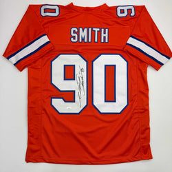 Autographed/Signed Neil Smith Denver Retro Orange Football Jersey JSA COA (ONLINE ORDER ONLY)