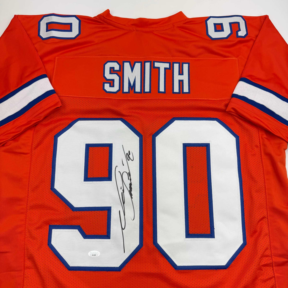 Autographed/Signed Neil Smith Denver Retro Orange Football Jersey JSA COA (ONLINE ORDER ONLY)
