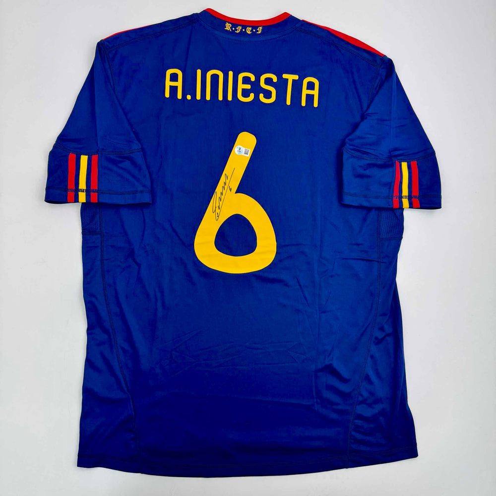 Autographed/Signed Andres Iniesta Spain Blue World Cup Soccer Futbol Jersey Beckett BAS COA (ONLINE ORDER ONLY)