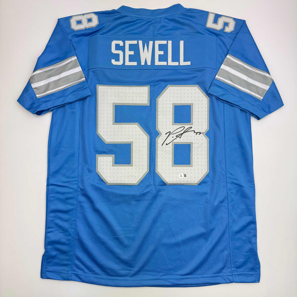 Autographed/Signed Penei Sewell Detroit Blue Current Football Jersey Beckett BAS COA (ONLINE ORDER ONLY)