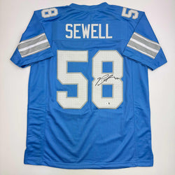 Autographed/Signed Penei Sewell Detroit Blue Current Football Jersey Beckett BAS COA (ONLINE ORDER ONLY)