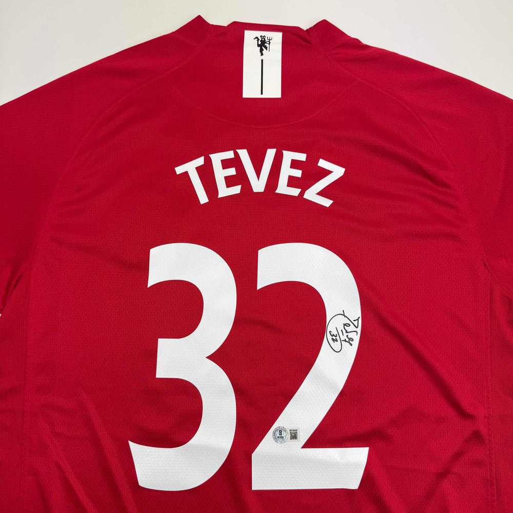 Autographed/Signed Carlos Tevez Manchester United Red Soccer Jersey Beckett BAS COA