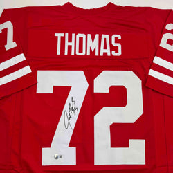 Autographed/Signed Joe Thomas Wisconsin Red College Football Jersey Beckett BAS COA