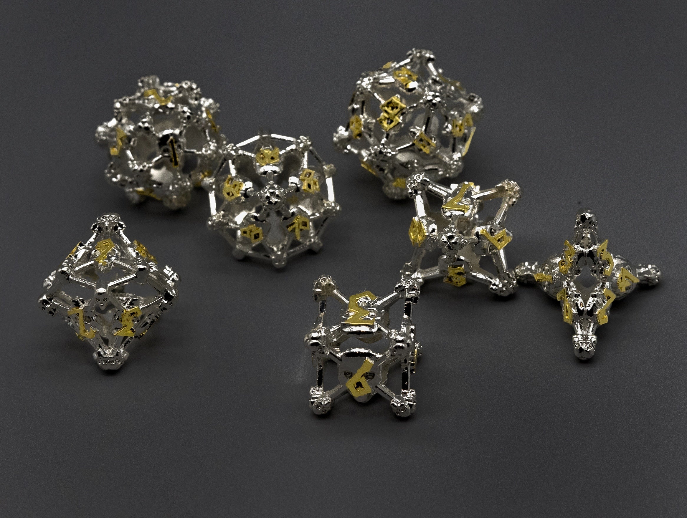 White w/Gold Deadly Skull Dice Hollow Metal 7-Dice Set (Online Only)