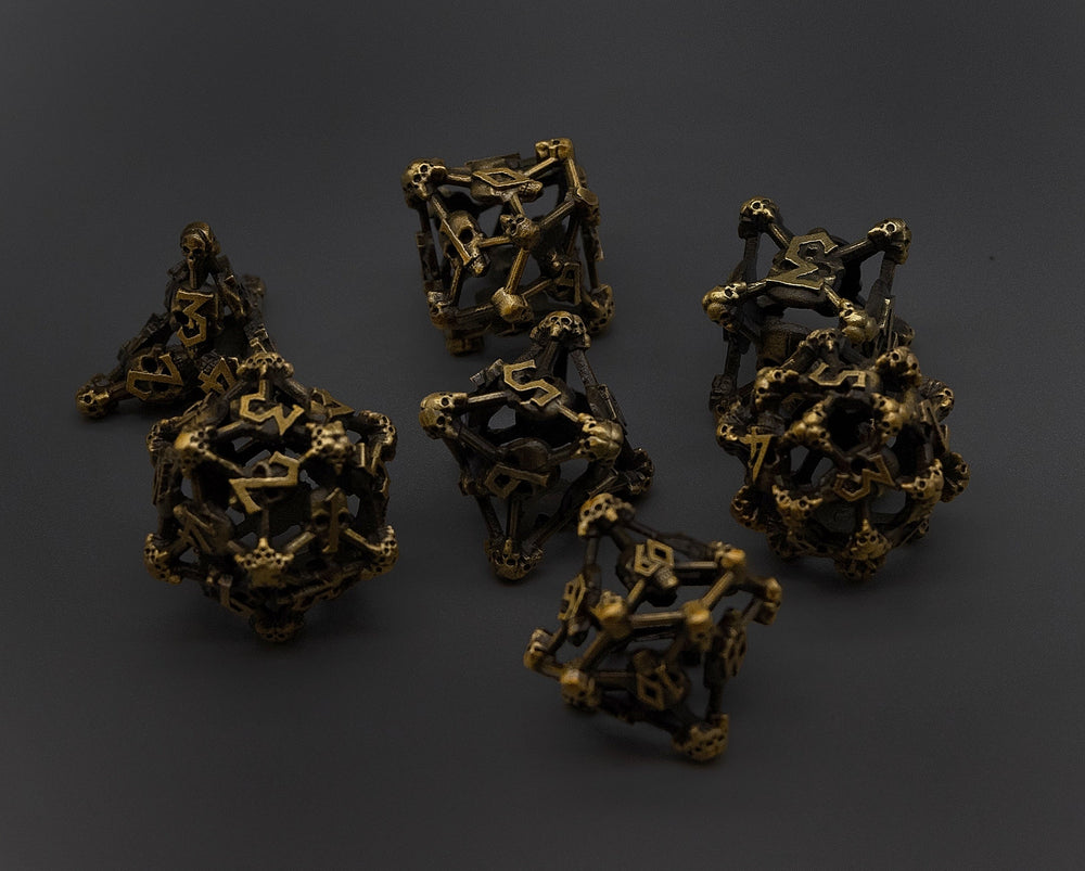 Gold Deadly Skull Dice Hollow Metal 7-Dice Set (Online Only)
