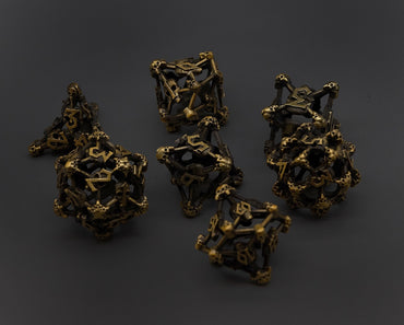 Gold Deadly Skull Dice Hollow Metal 7-Dice Set (Online Only)