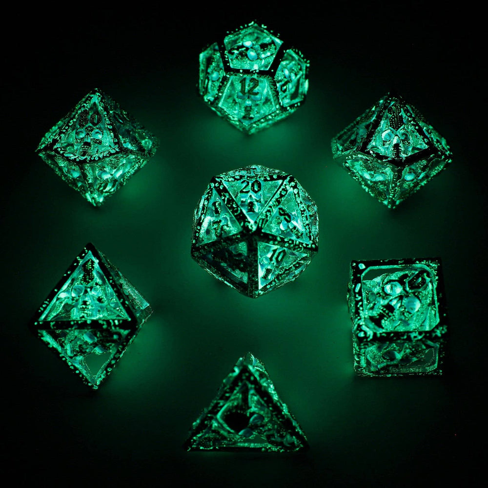Skull's Grin Hollow Metal Dice Set - Glow in the Dark Blue (ONLINE ORDER ONLY)