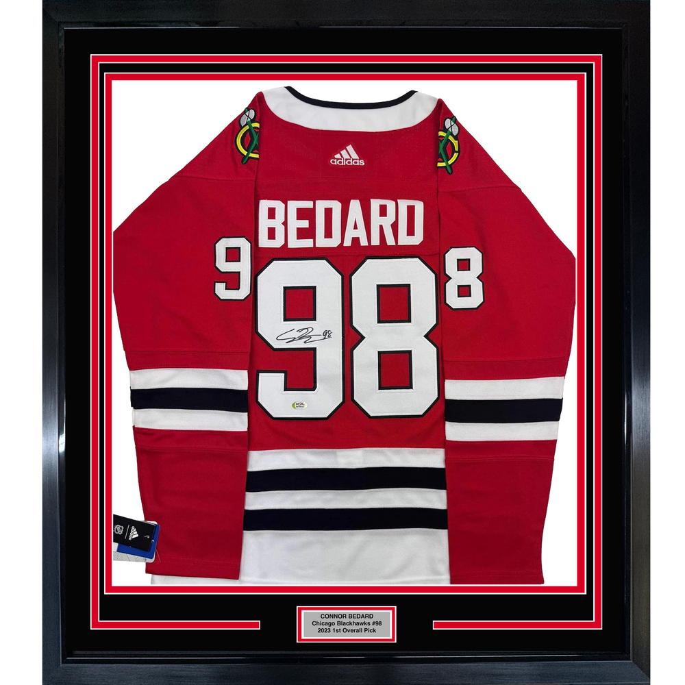 Framed Autographed/Signed Connor Bedard 35x39 Chicago Blackhawks Red Hockey Jersey PSA COA