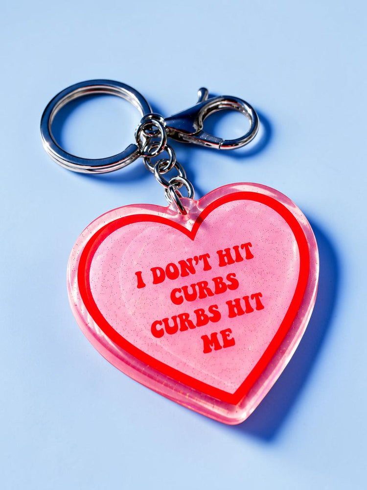 I Don't Hit Curbs Curbs Hit Me Holographic Heart Keychain