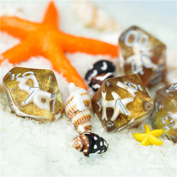 White Starfish Dice on Gold 7-Dice Set Resin Dungeons and Dragons Dice (Online Only)