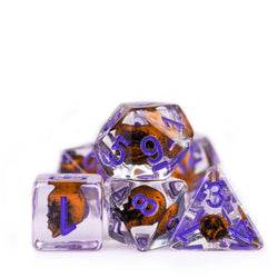 Orange Skull Dice | Clear RPG 7-Dice Set w/ Purple Numbers (Online Only)