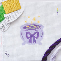 Cotswold Co Designs - Magic Cauldren Halloween Needlepoint Canvas, 18 mesh, 4x4” design, modern trendy needlepoint canvas, bow Halloween needlepoint (ONLINE ORDER ONLY)