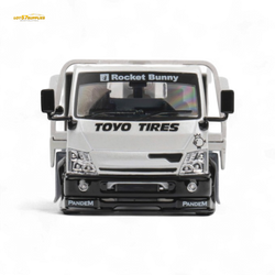 MicroTurbo HINO 300 Flat Bed Transport Truck in Pandem Rocket Bunny White 1:64 (ONLINE ORDER ONLY)