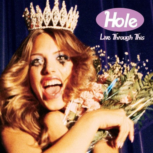 Live Through This (Limited Edition, Light Rose Colored Vinyl) [Import] [Vinyl] (ONLINE ORDER ONLY)