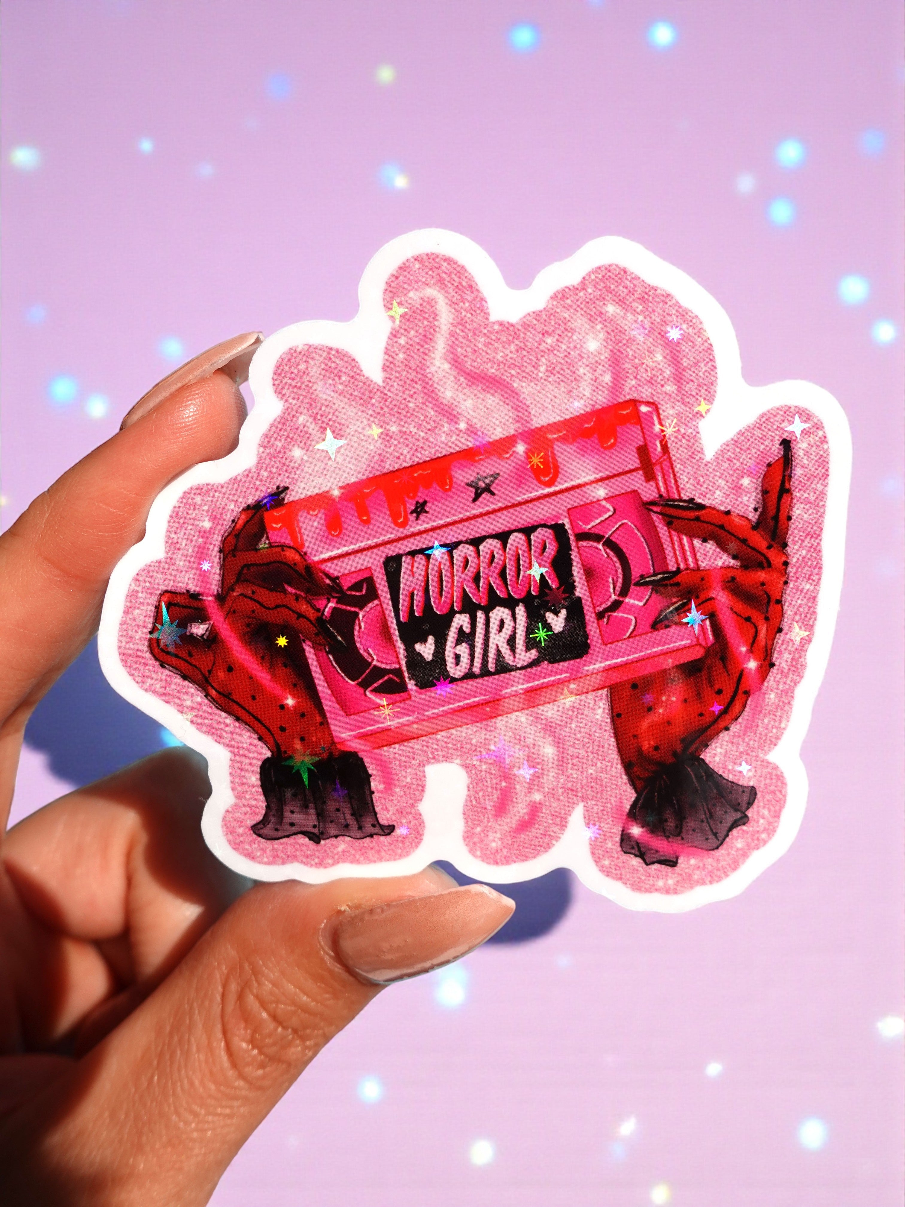 Horror Girl Sticker – Pink VHS Tape Holographic Vinyl Sticker (ONLINE ORDER ONLY)