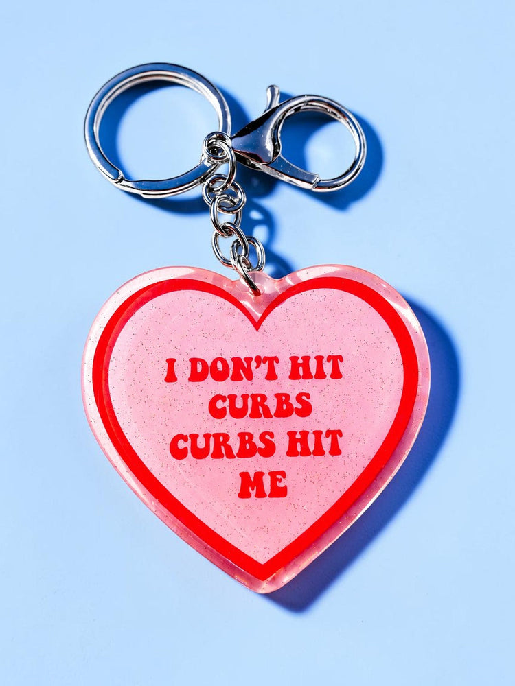 I Don't Hit Curbs Curbs Hit Me Holographic Heart Keychain