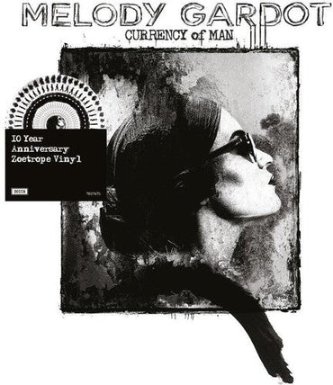 Currency Of Man: 10 Year Anniversary Edition (Limited Edition, Zoetrope Vinyl) [Import] [Vinyl] (ONLINE ORDER ONLY)