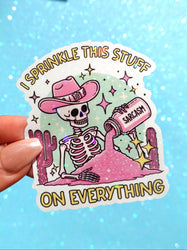 I Sprinkle This Stuff on Everything Sticker – Funny Cowboy Skeleton Holographic Vinyl Sticker (ONLINE ORDER ONLY)